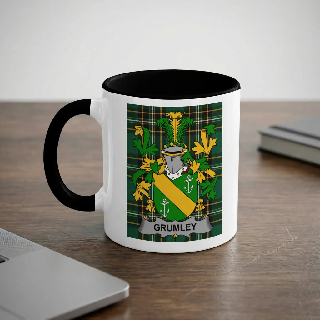 Mug with the GRUMLEY coat of arms on a desk.