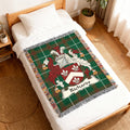 Green tartan blanket with a family crest and "Richards" text.