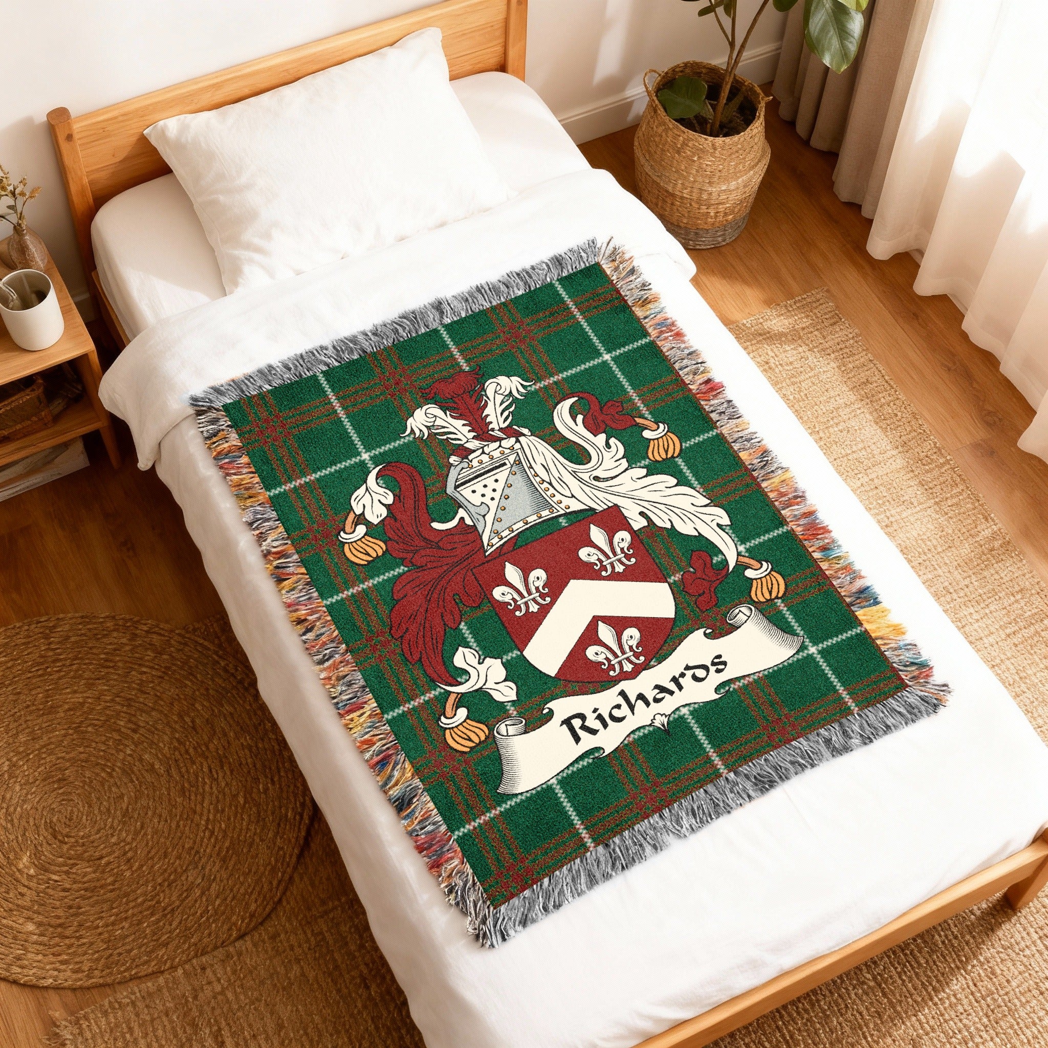 Green tartan blanket with a family crest and "Richards" text.