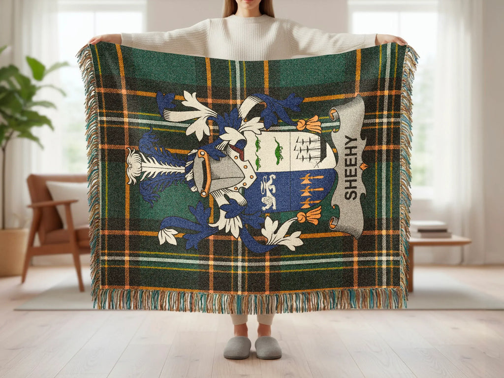 Tartan blanket with Sheedy family crest and fringe.