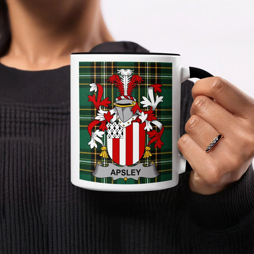 Black mug with Apsley coat of arms on a tartan background.