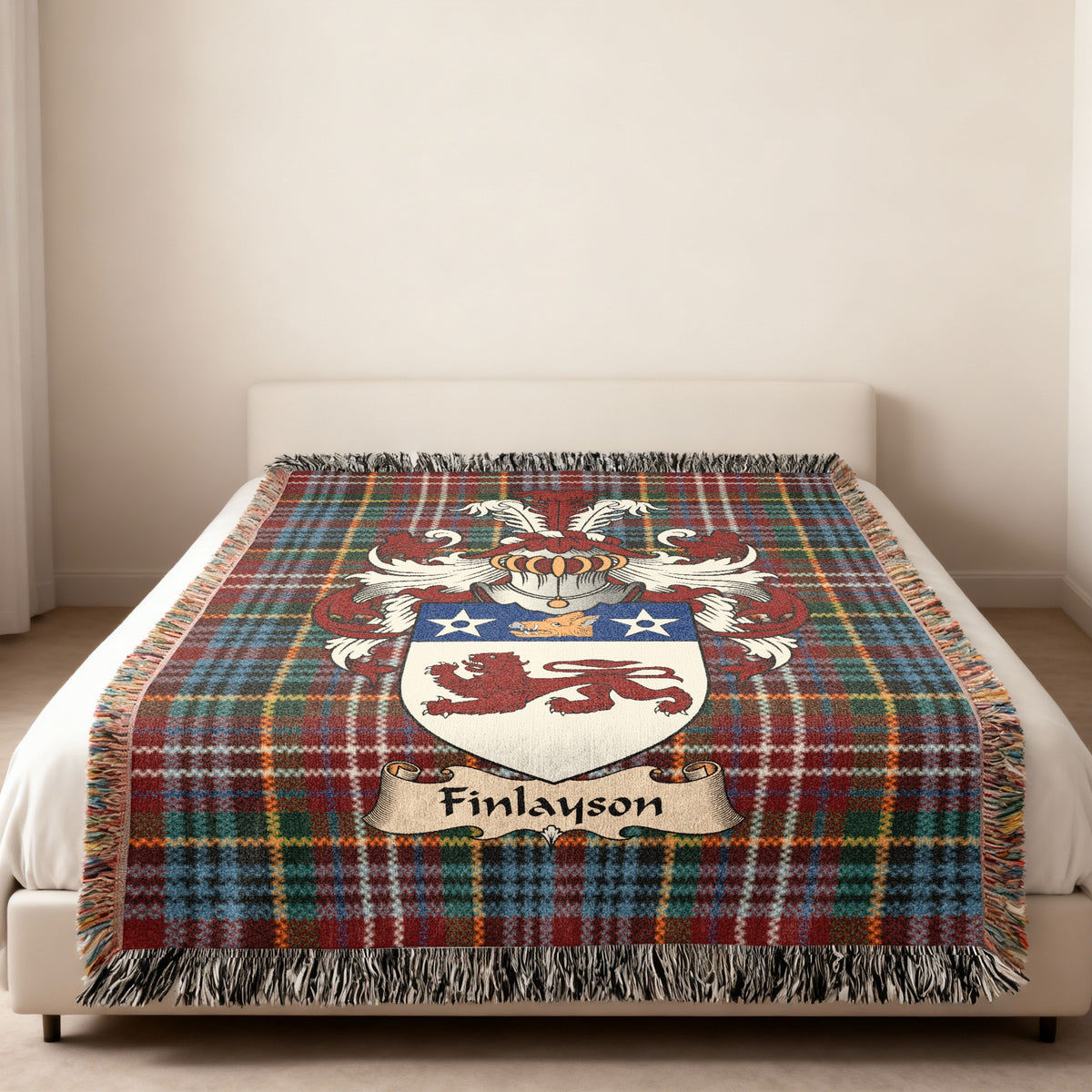 Finlayson Scottish family shield woven blanket on a Caledonia tartan background