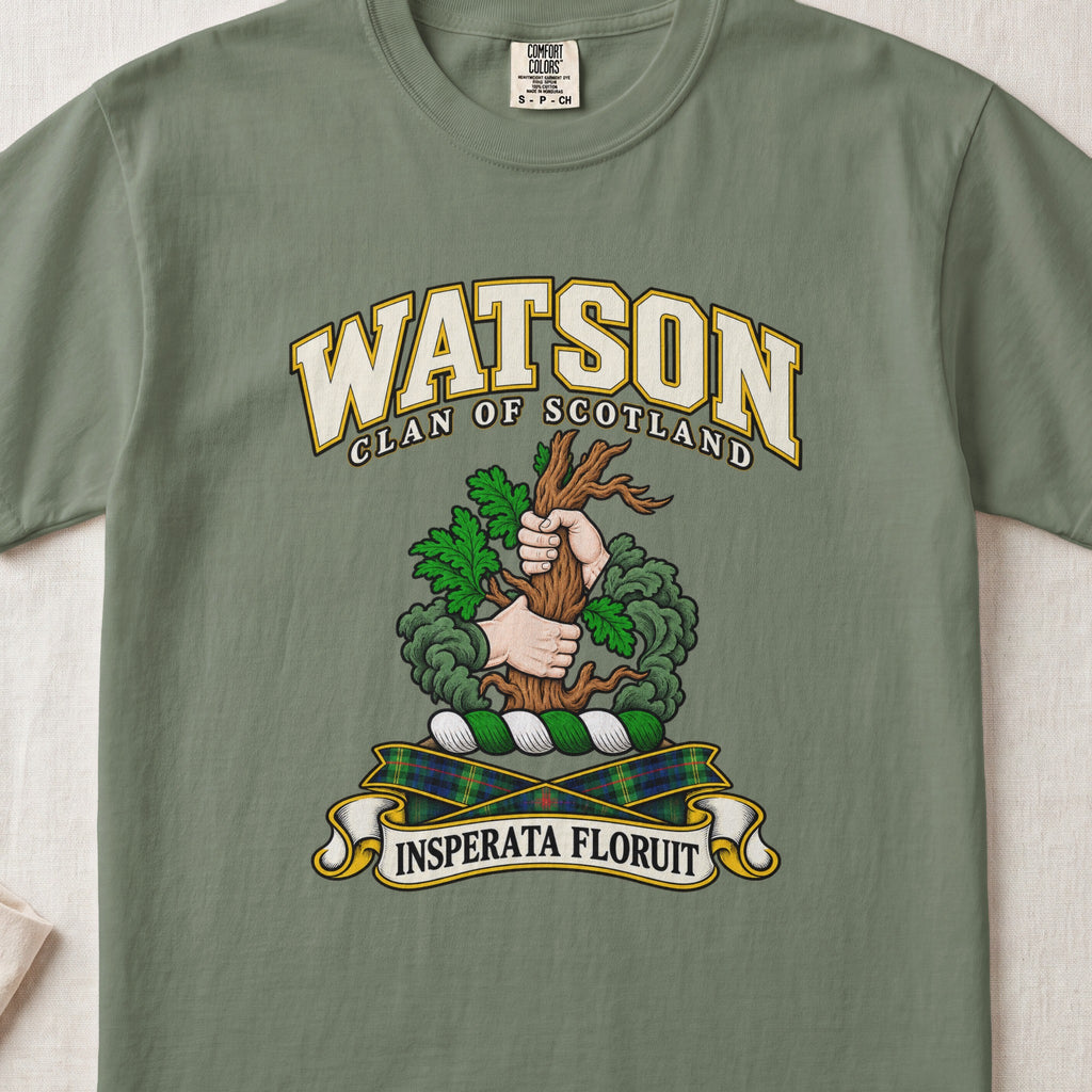 Watson Scottish clan T-shirt in Moss, front view with two hands gripping a tree trunk with green foliage and motto banner.