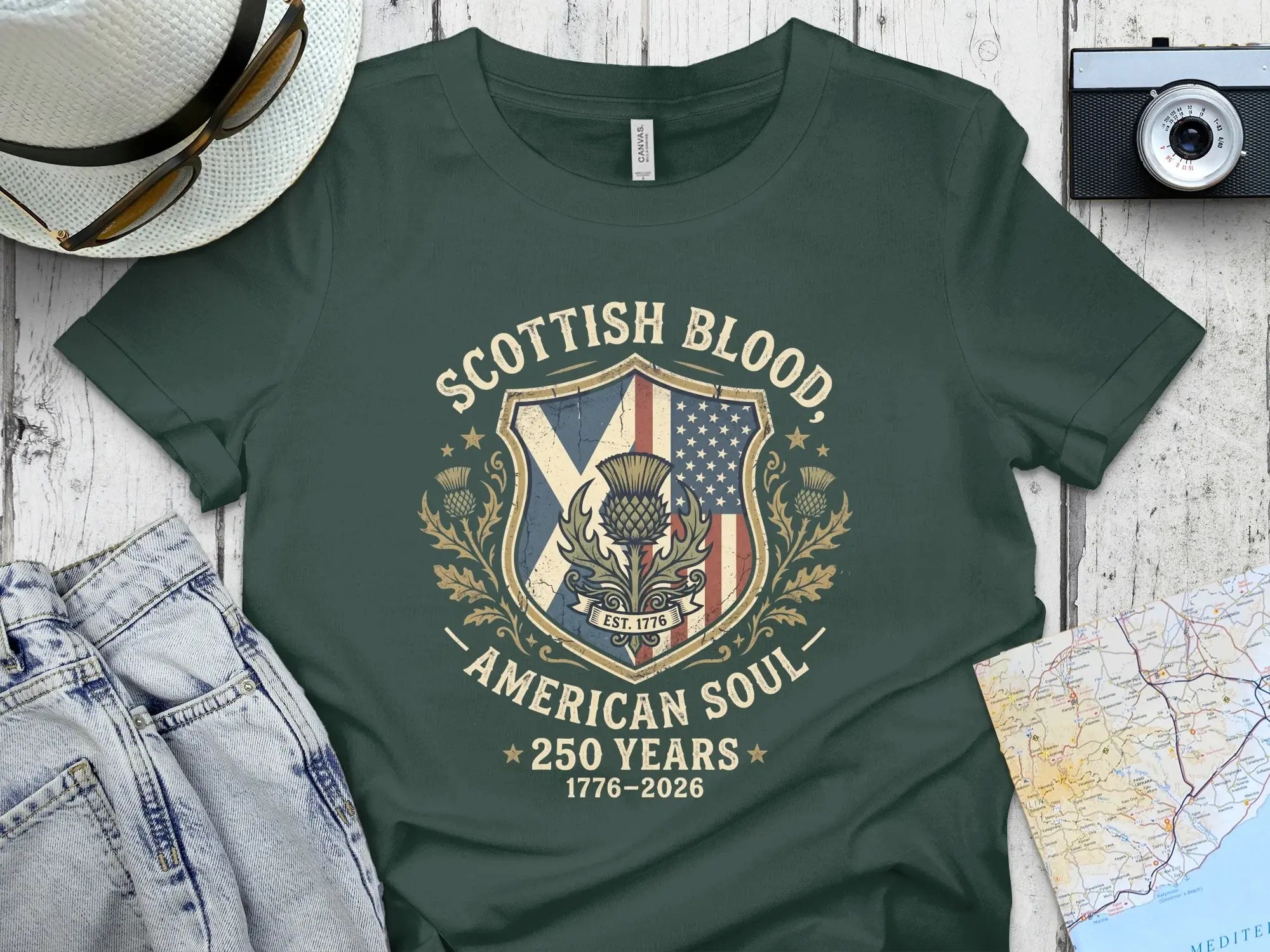 Dark green t-shirt with "Scottish Blood, American Soul" design.