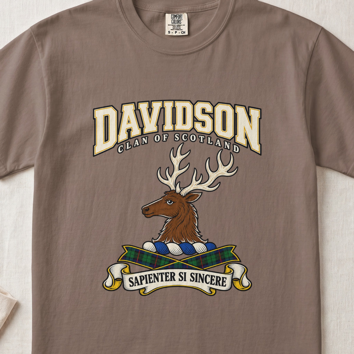 Espresso brown Davidson Scottish clan T-shirt, front flat lay with cream varsity lettering, stag crest and tartan ribbon.
