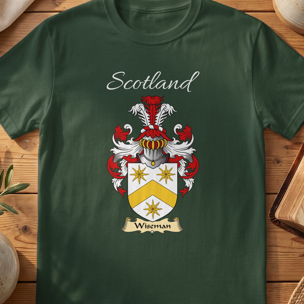 Forest Green Wiseman Scottish T-shirt laid flat with coat of arms artwork and “Scotland” text.