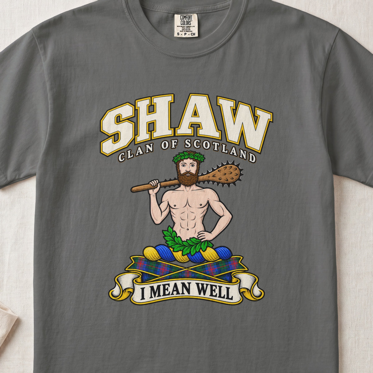Shaw Scottish clan T-shirt in Pepper, front view with a bearded figure carrying a wooden club over one shoulder and motto banner.
