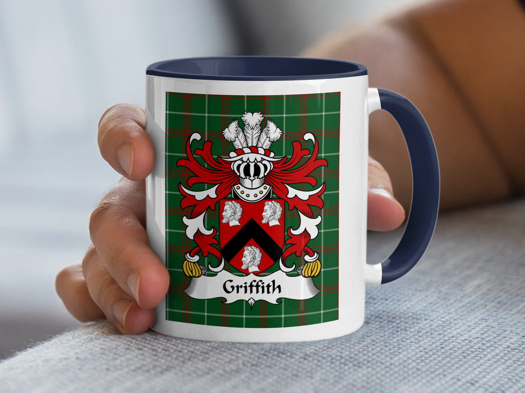 Mug with Griffith family crest on a green and red tartan background.