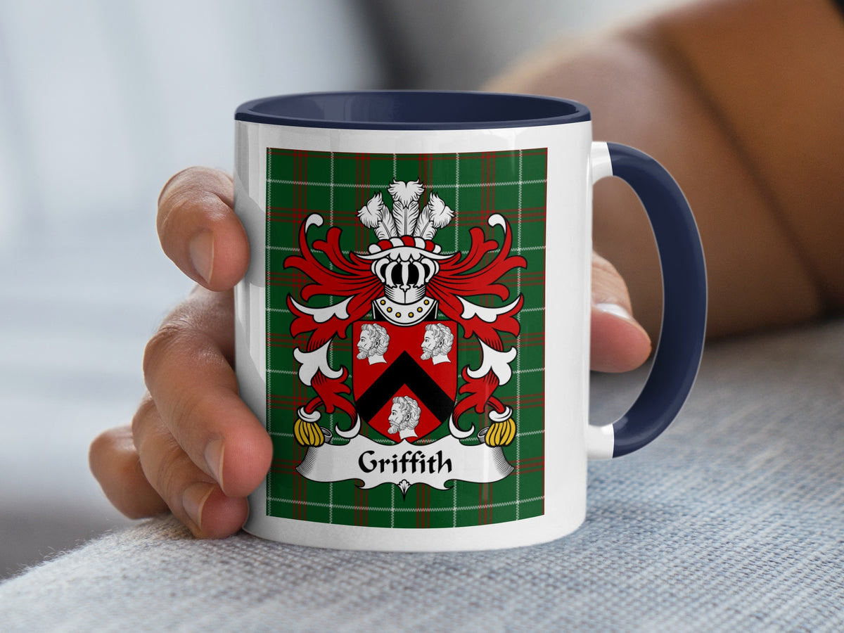 Mug with Griffith family crest on a green and red tartan background.