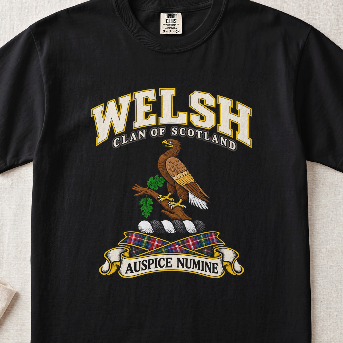 Welsh Scottish clan T-shirt in Black, front view with a brown eagle perched on a leafy branch and motto banner.