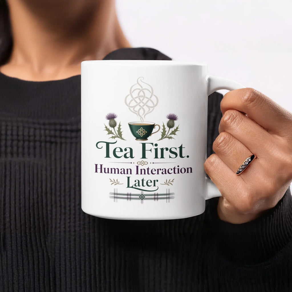 Mug with "Human Interaction Later" text, thistle and teacup graphics.