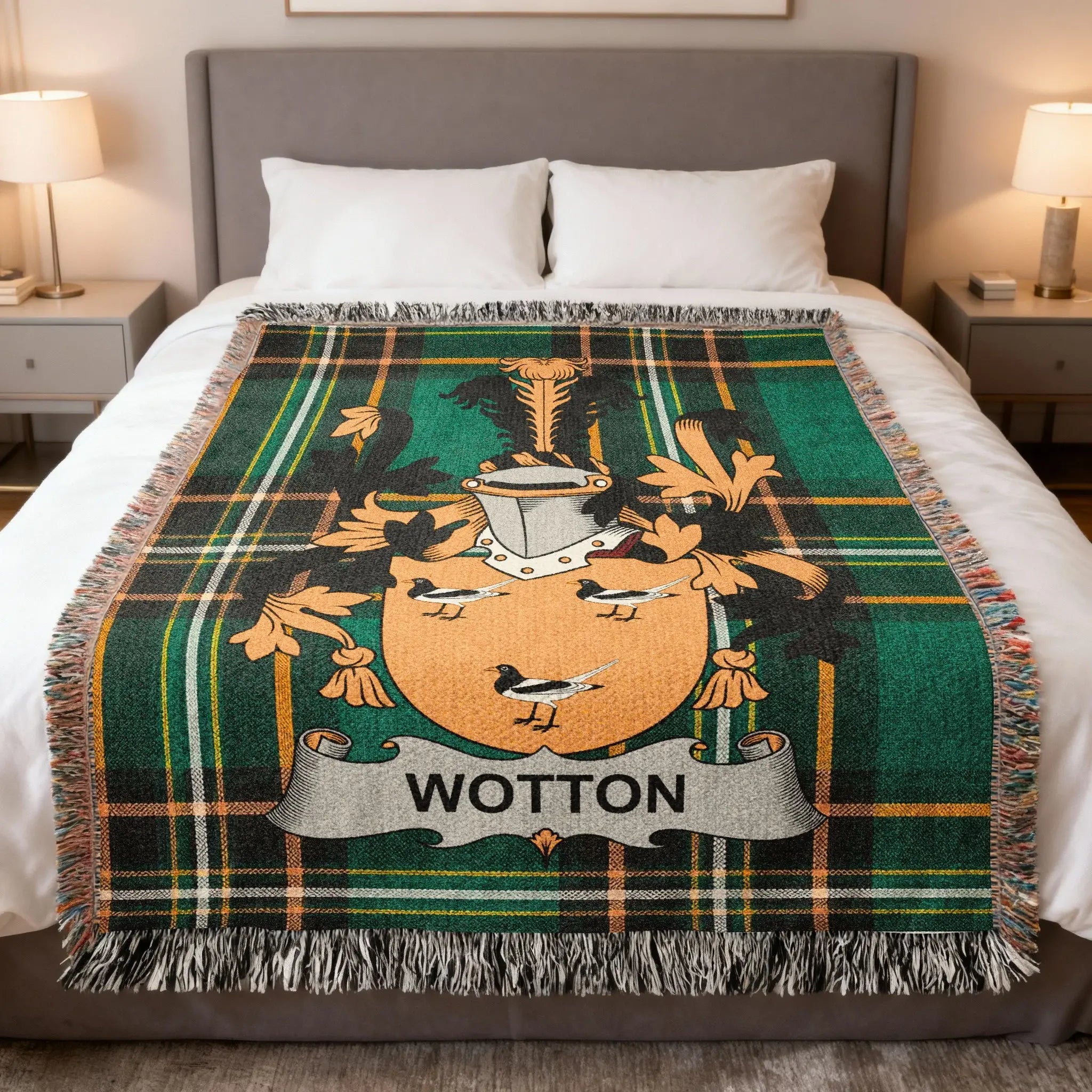 Wotton family crest on a green plaid woven blanket on a bed.