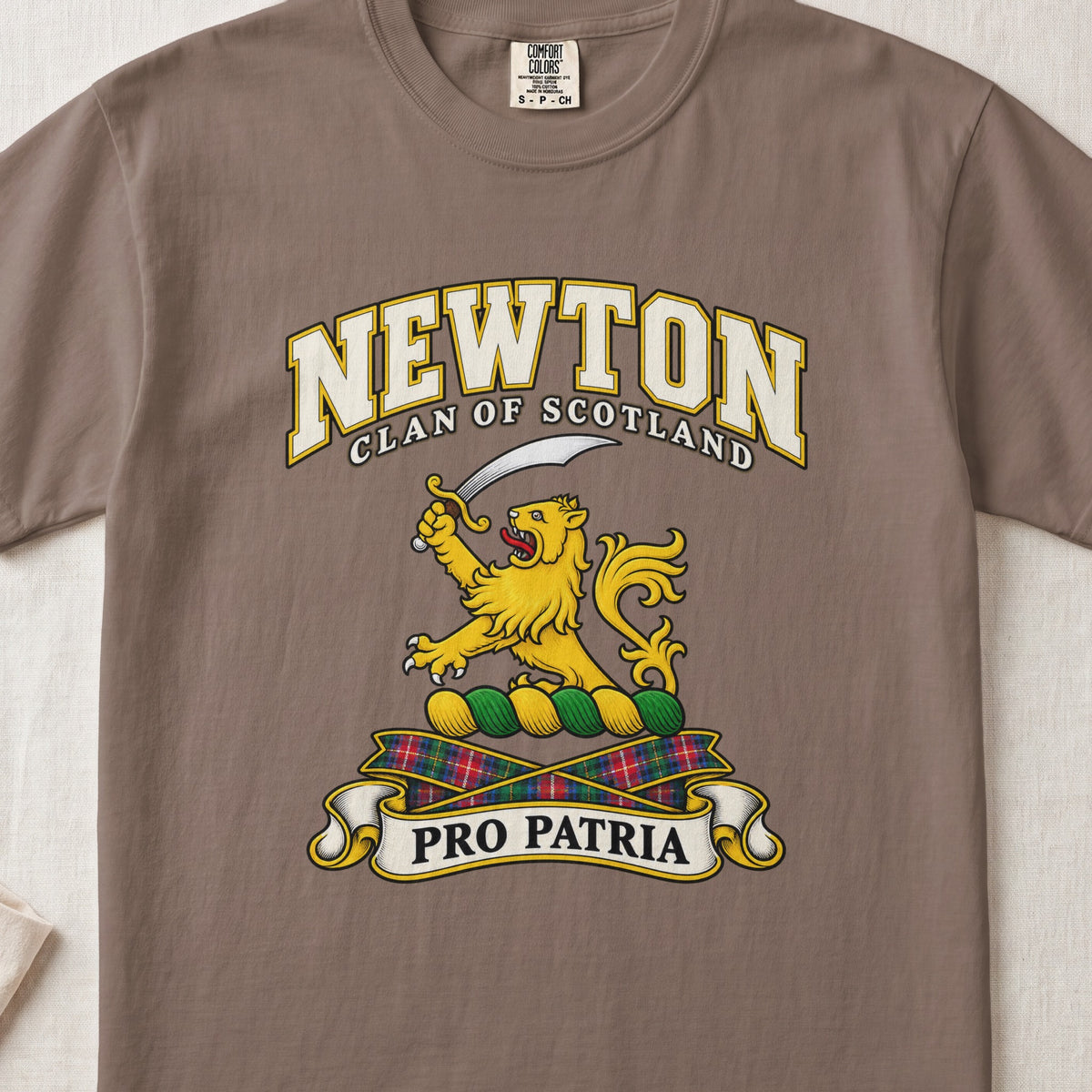 Newton Scottish clan T-shirt in Espresso, front view with a gold lion holding a curved sword and motto banner.