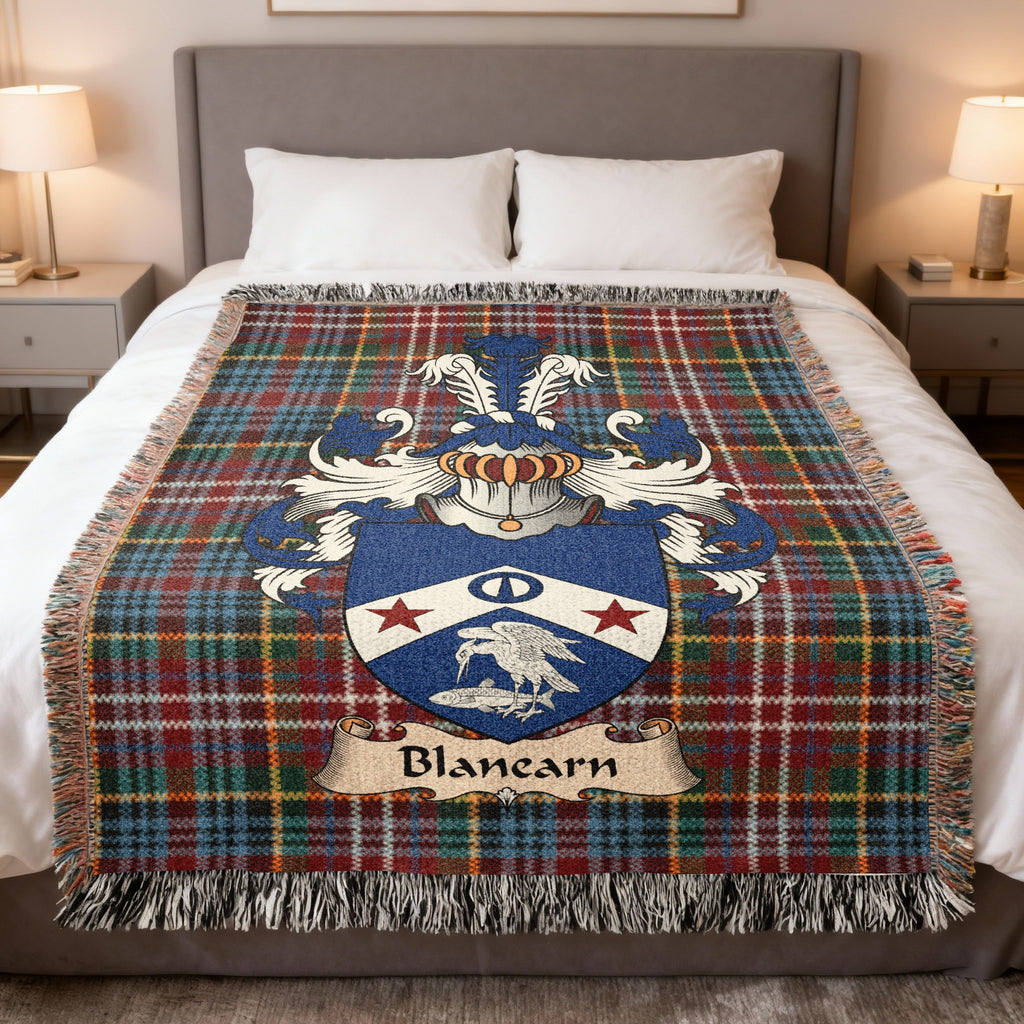 Blanearn family crest emblem on a Caledonia tartan woven blanket