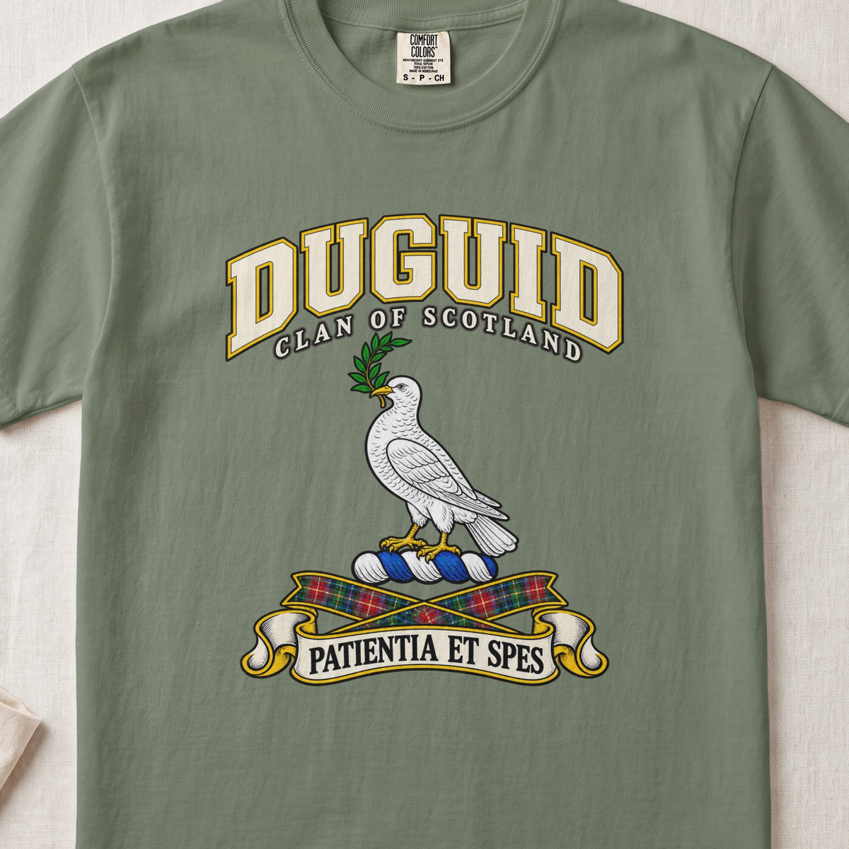 Duguid Scottish clan T-shirt in Moss, front view with a white dove holding a green branch and motto design.