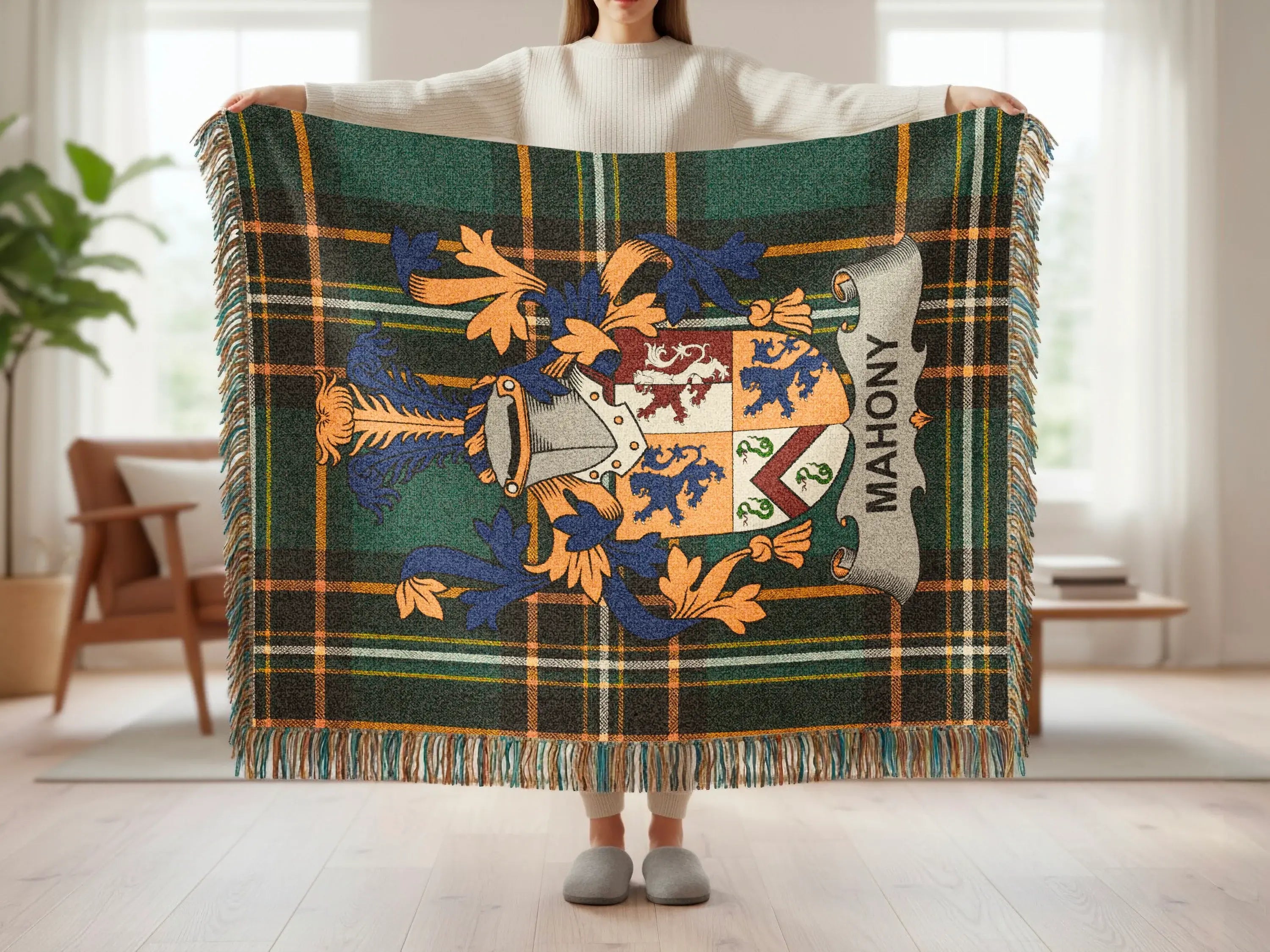Mahony tartan blanket featuring a coat of arms with a shield, helmet, and banners.
