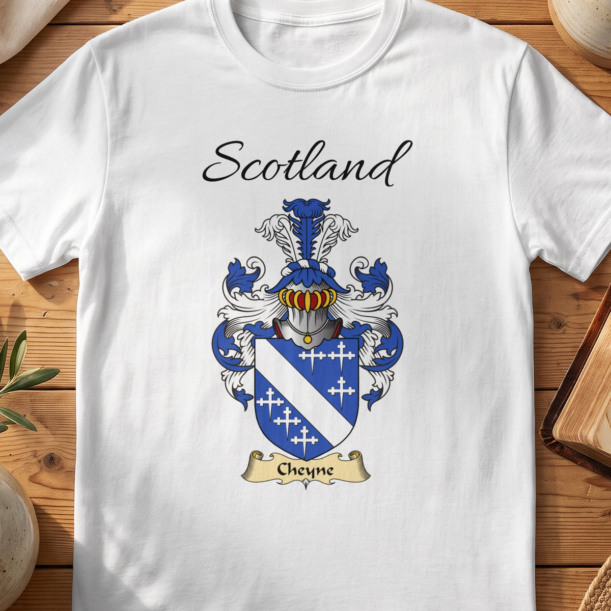 White Cheyne Scottish family shield T-shirt featuring a white diagonal band and small crosses on blue