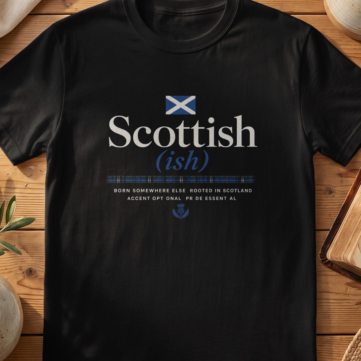 Black Gildan 64000 unisex T-shirt flatlay with Scottish Ish Scottish graphic design