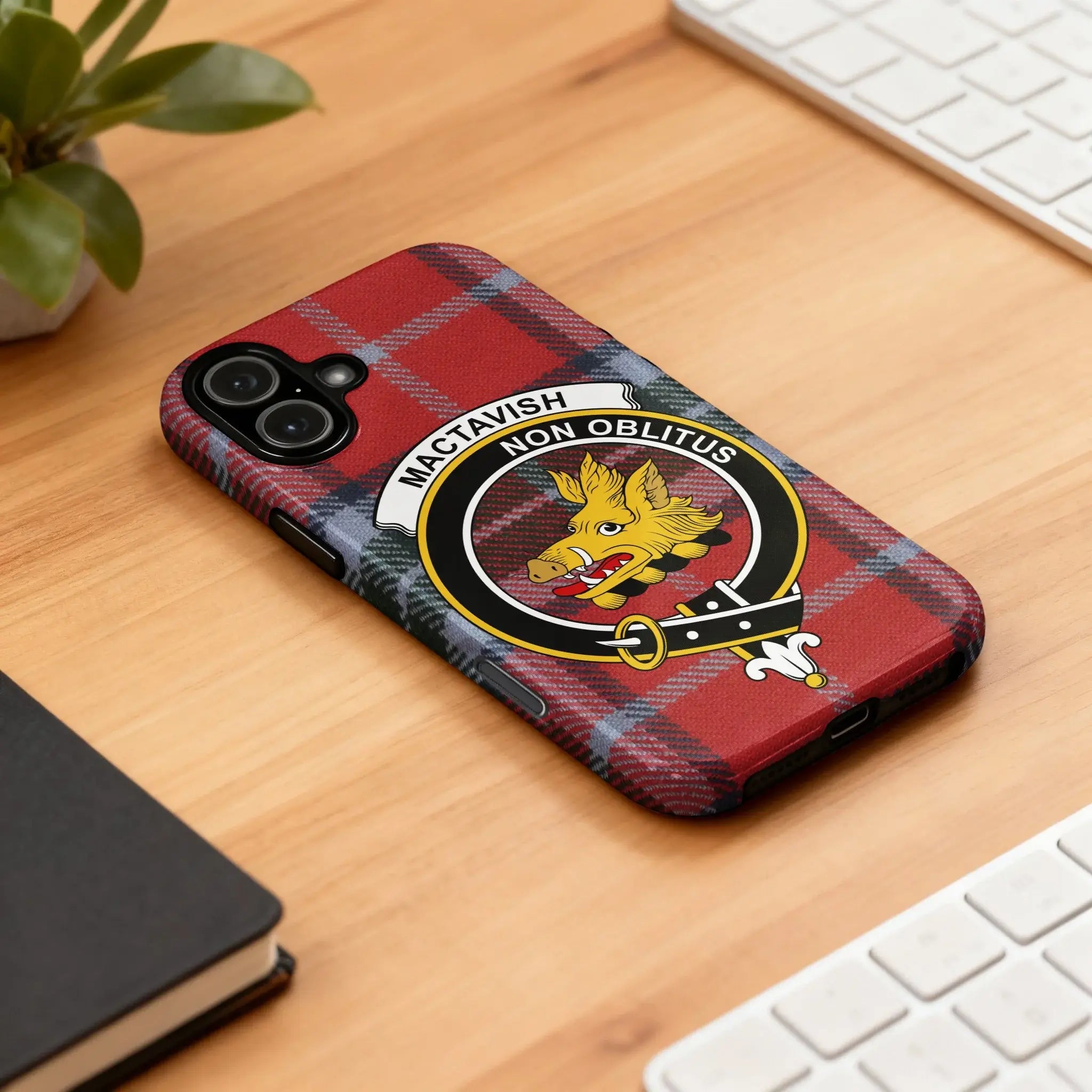 MacTavish clan crest tartan iPhone case — edge-to-edge red and black plaid with Non Oblitus boar