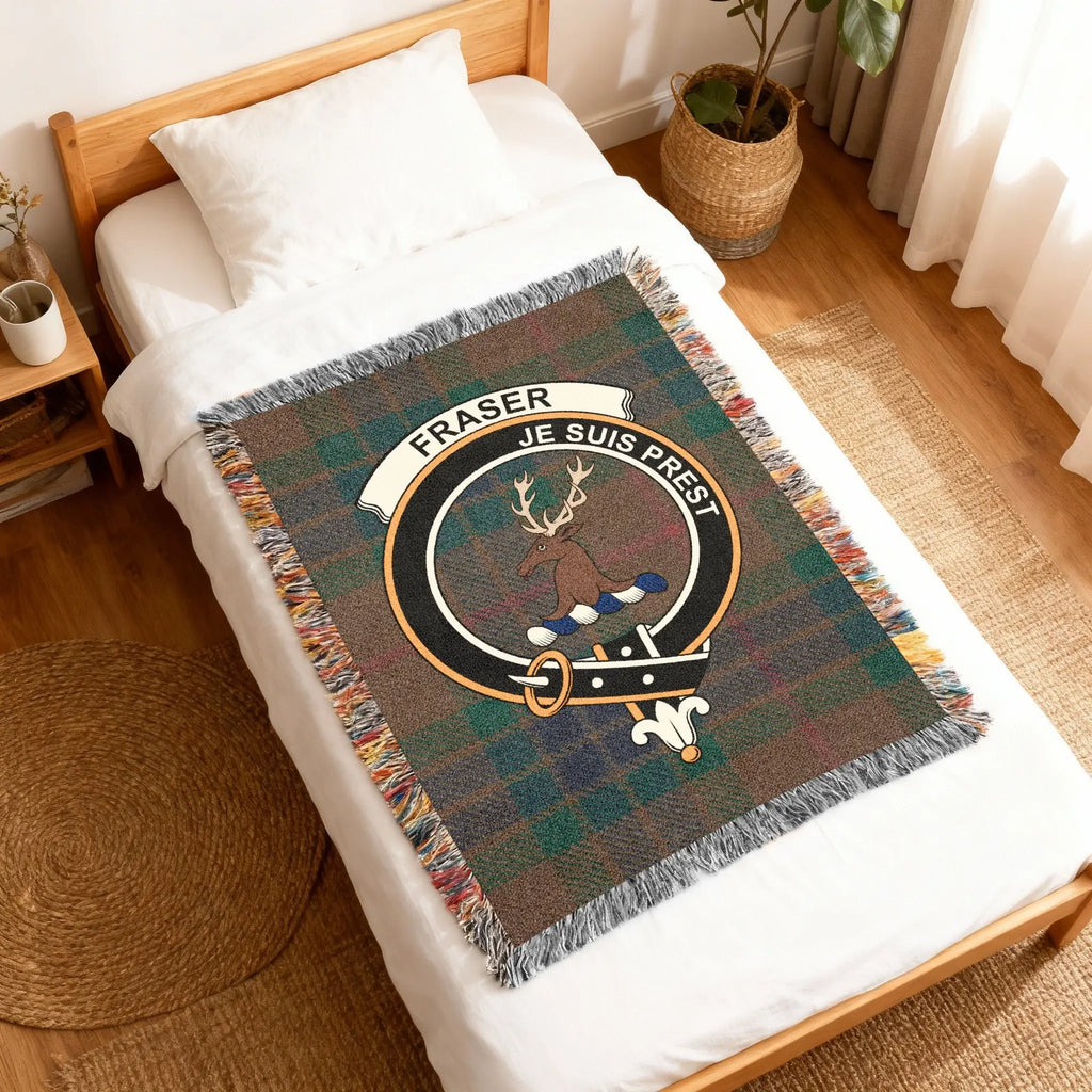 Fraser Je Suis Prest woven blanket flat lay — red and black tartan with clan crest panel