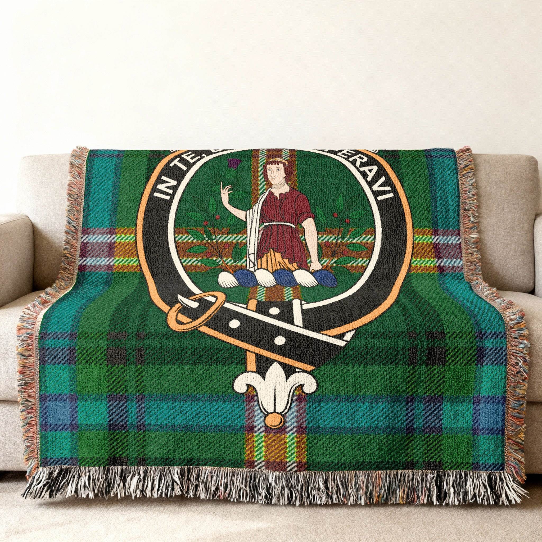 Clan Lyon tartan woven blanket — fringe border detail showing woven pattern and clan crest