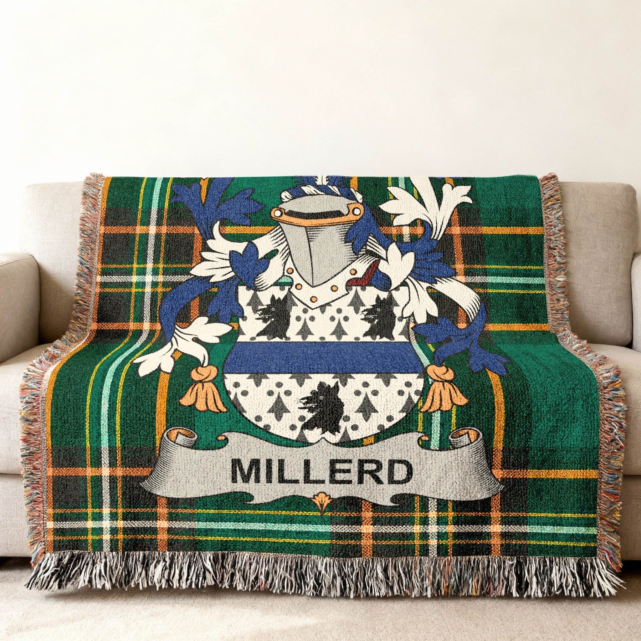 Miller family crest on a green plaid throw blanket.