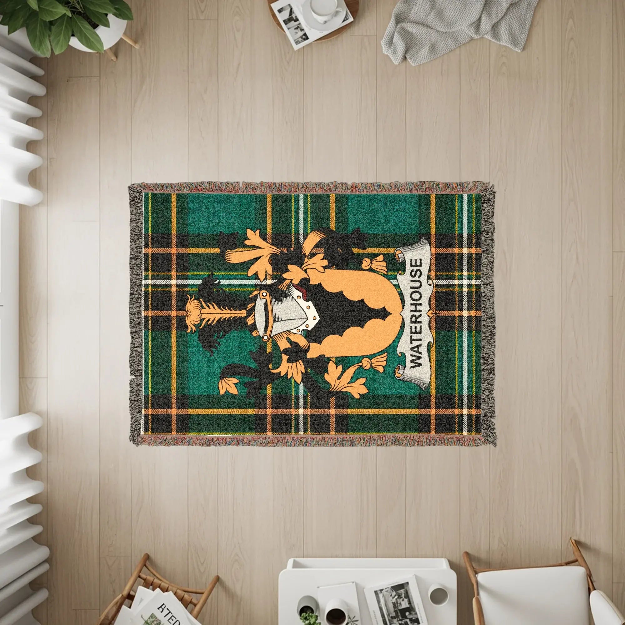 Tapestry throw rug with Waterhouse crest on a green plaid background.