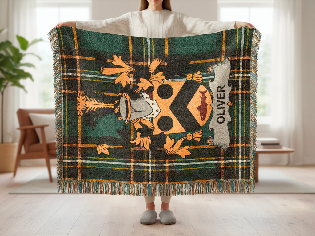 Tartan blanket with Oliver coat of arms and fringe.