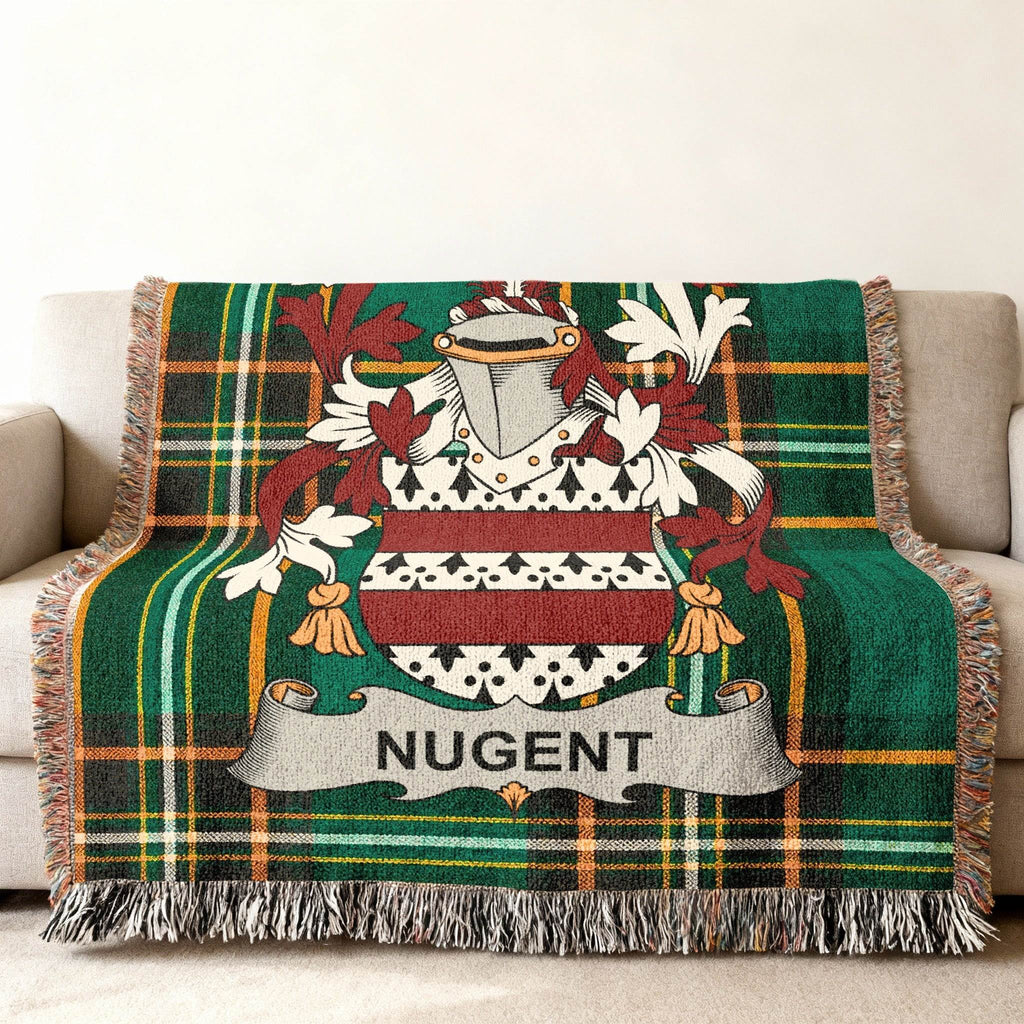 Tapestry throw blanket with a green plaid pattern and a coat of arms bearing the name NUGENT.