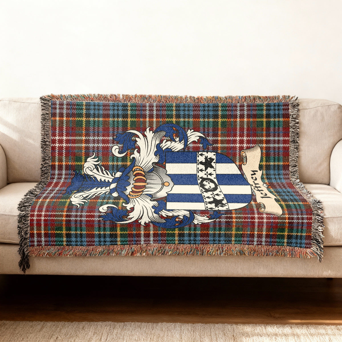 Jeffrey Scottish woven blanket with family shield and Caledonia tartan background