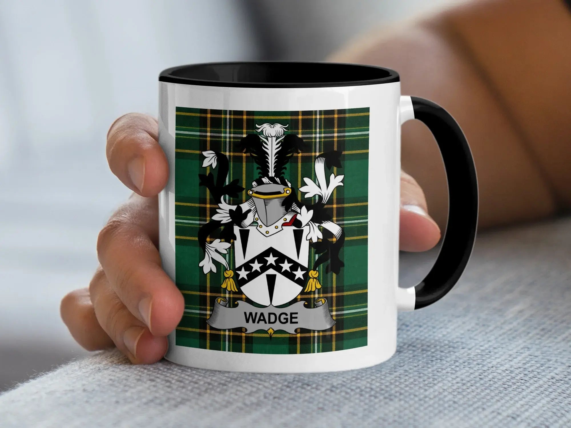 White mug with black handle displaying a family crest with the name "WADGE."