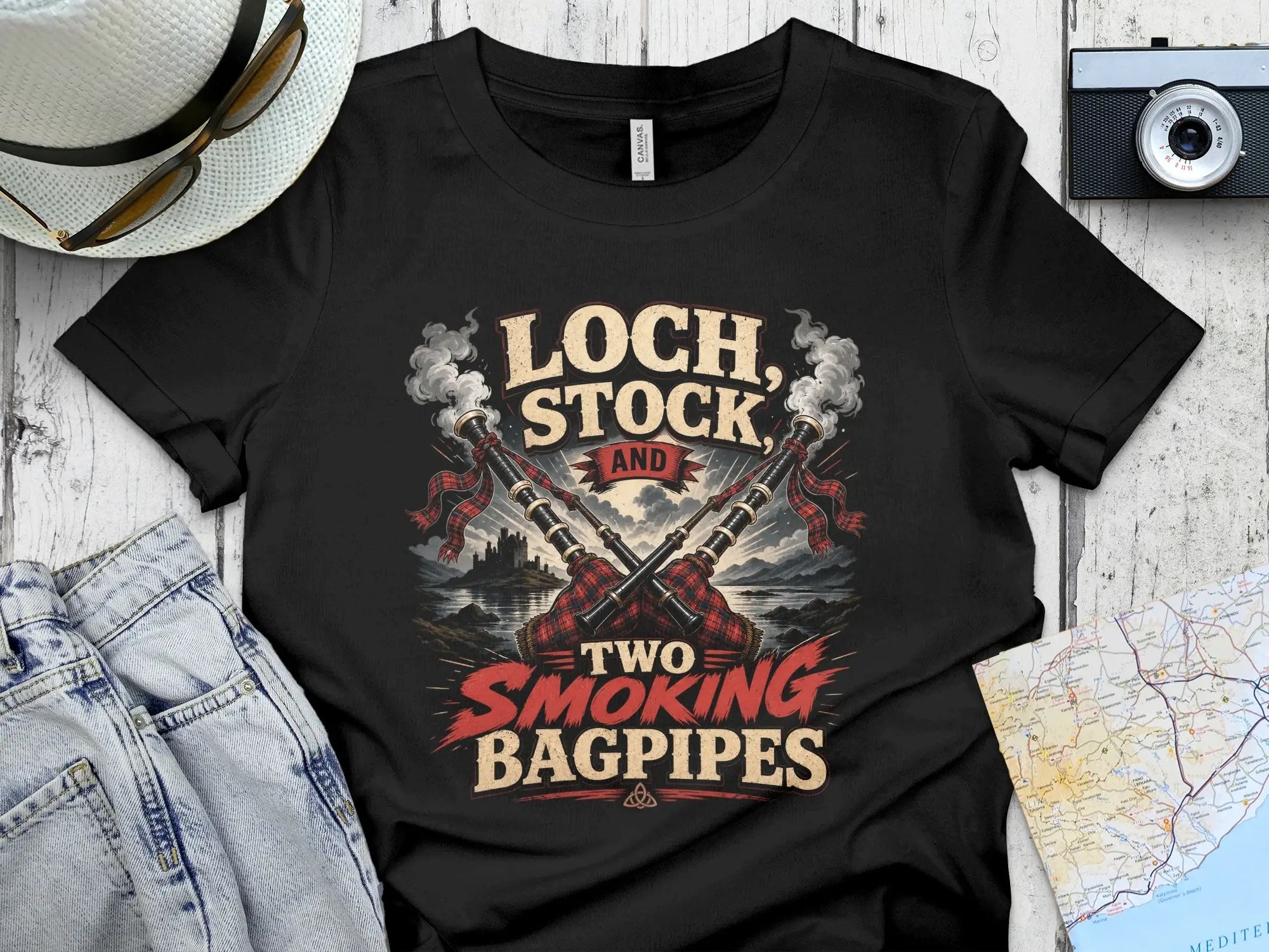 Black t-shirt with "Loch, Stock and Two Smoking Bagpipes" text and bagpipes graphic.