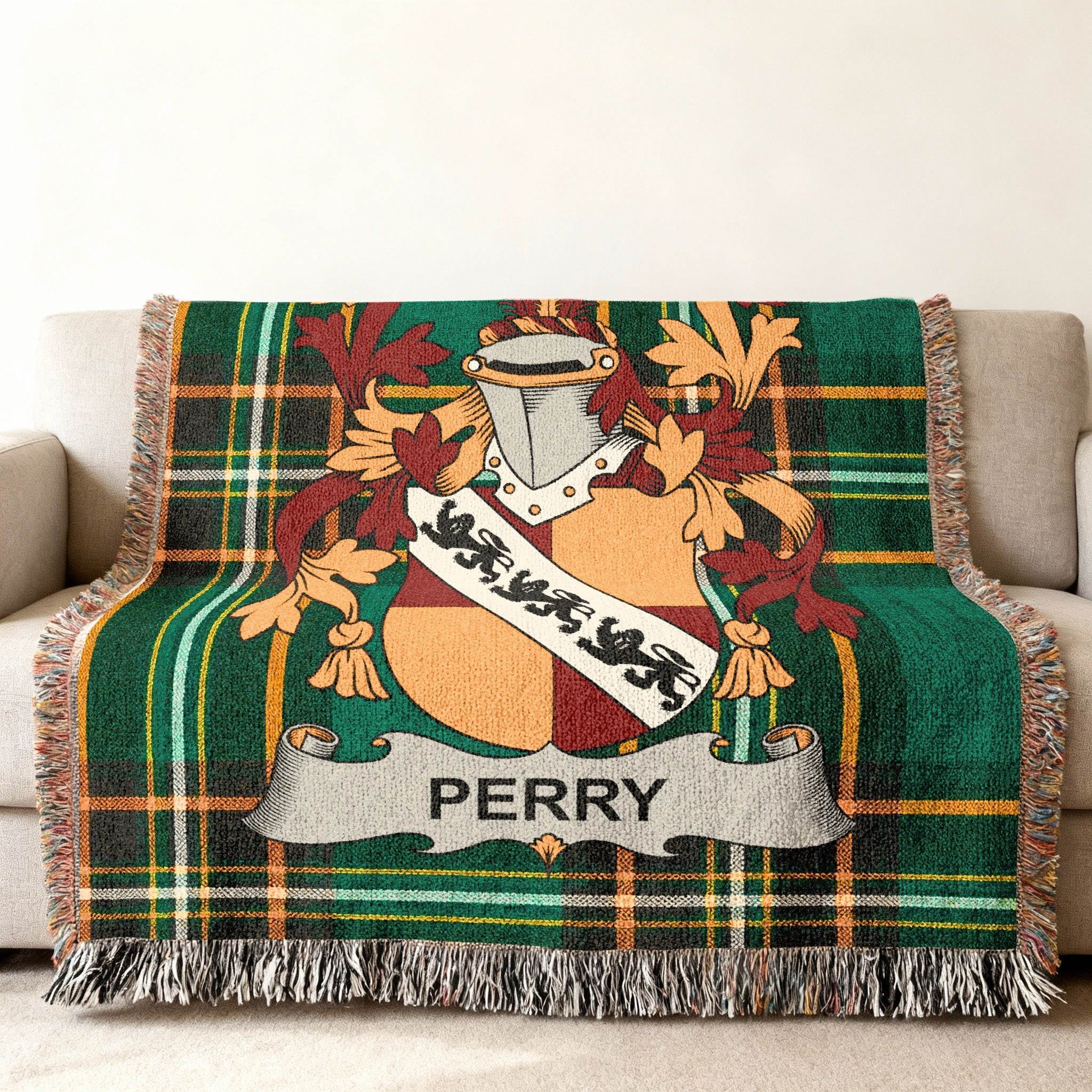 Green tartan throw blanket featuring the Perry family crest.
