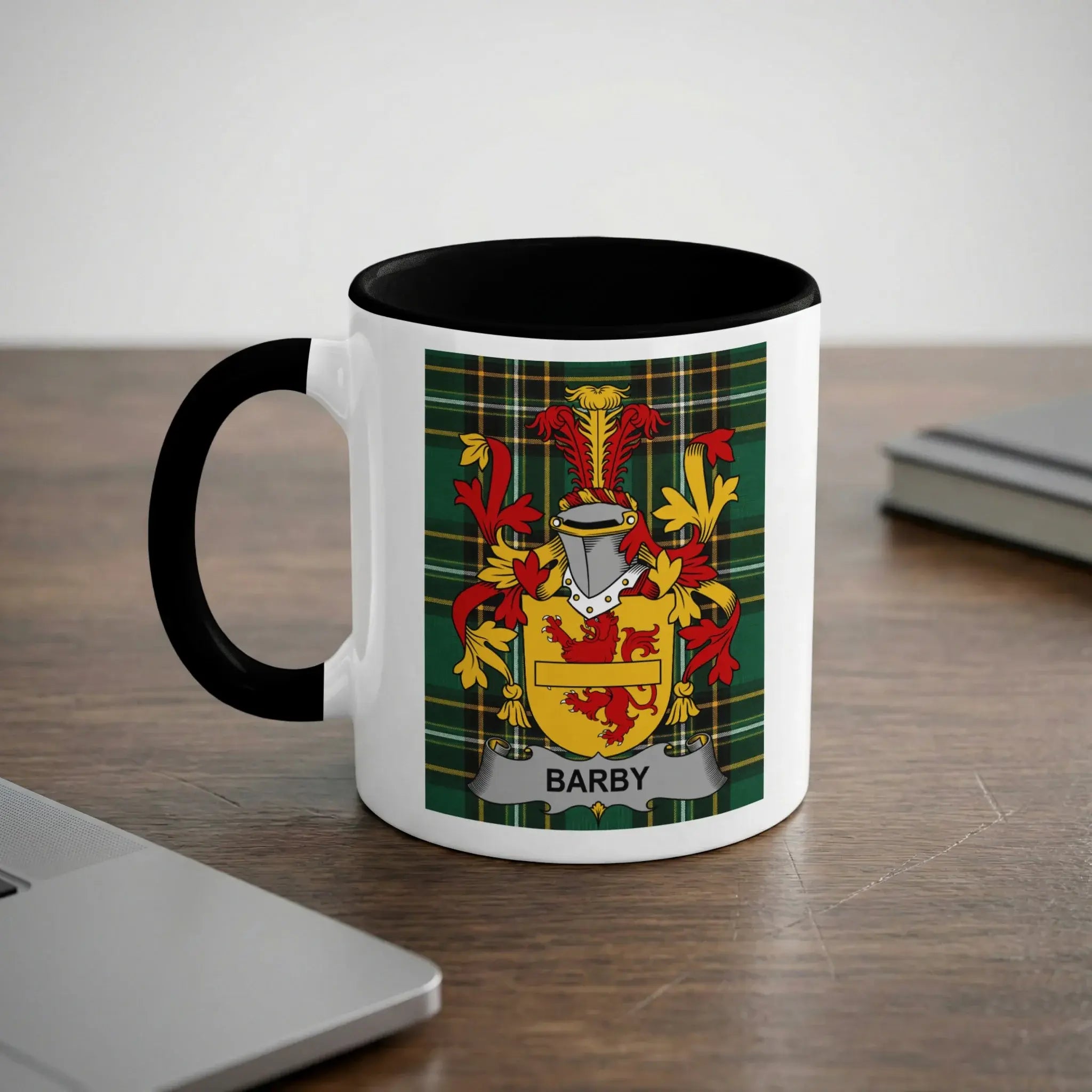 White mug with black handle featuring a coat of arms with the name "Barby".