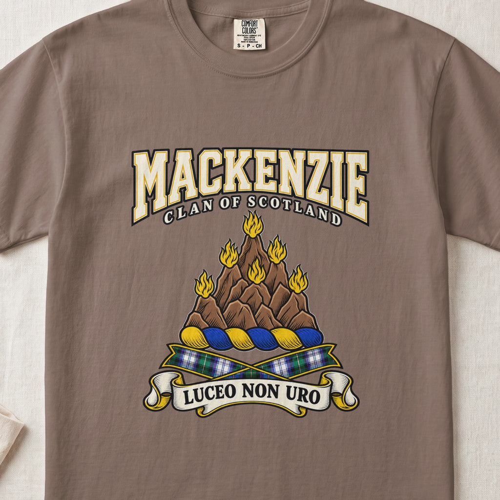 MacKenzie graphic T-shirt in Espresso brown, front flat lay showing varsity lettering and brown rocky mount with six gold flames.