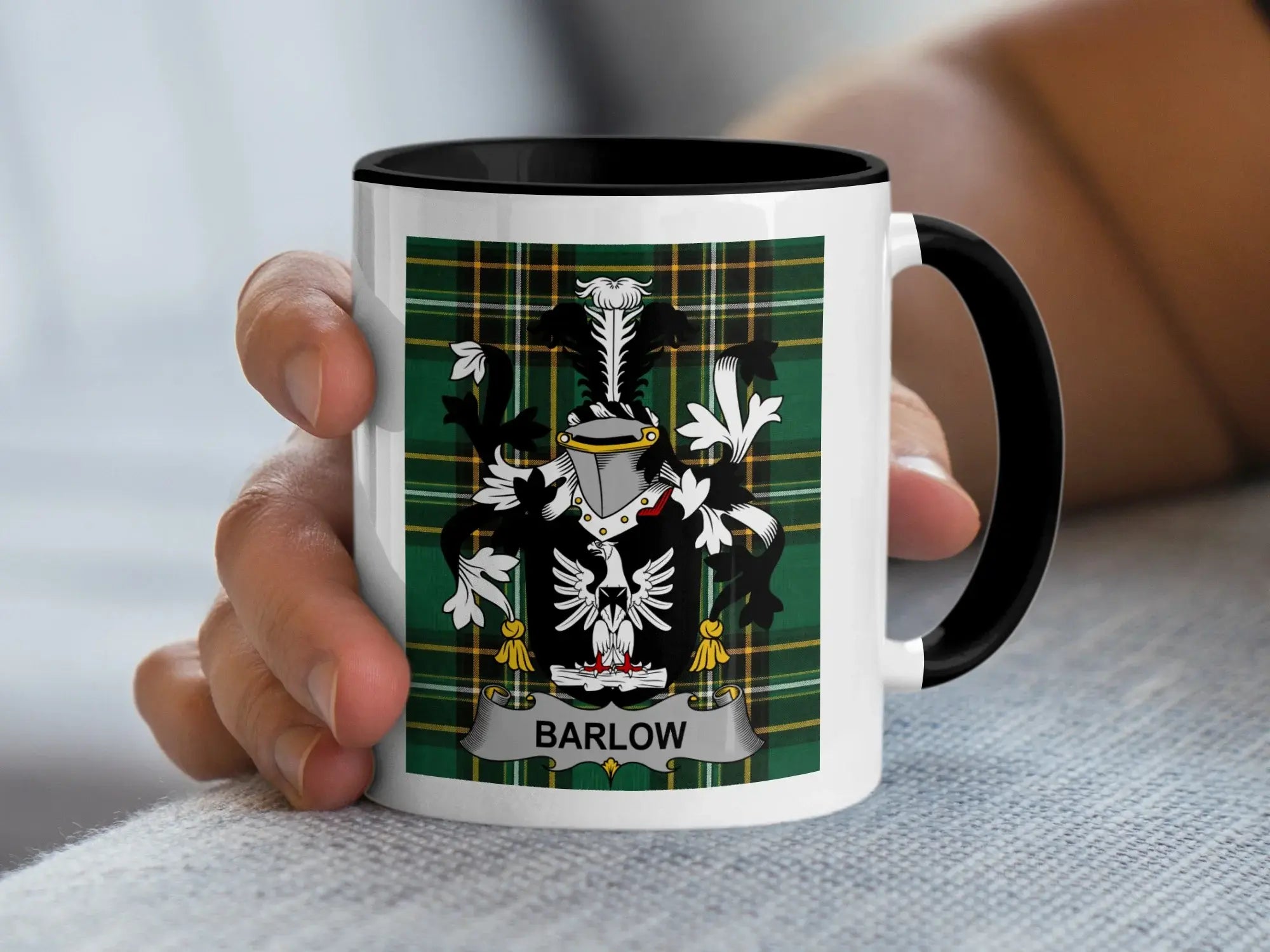 White mug with Barlow coat of arms on tartan background.