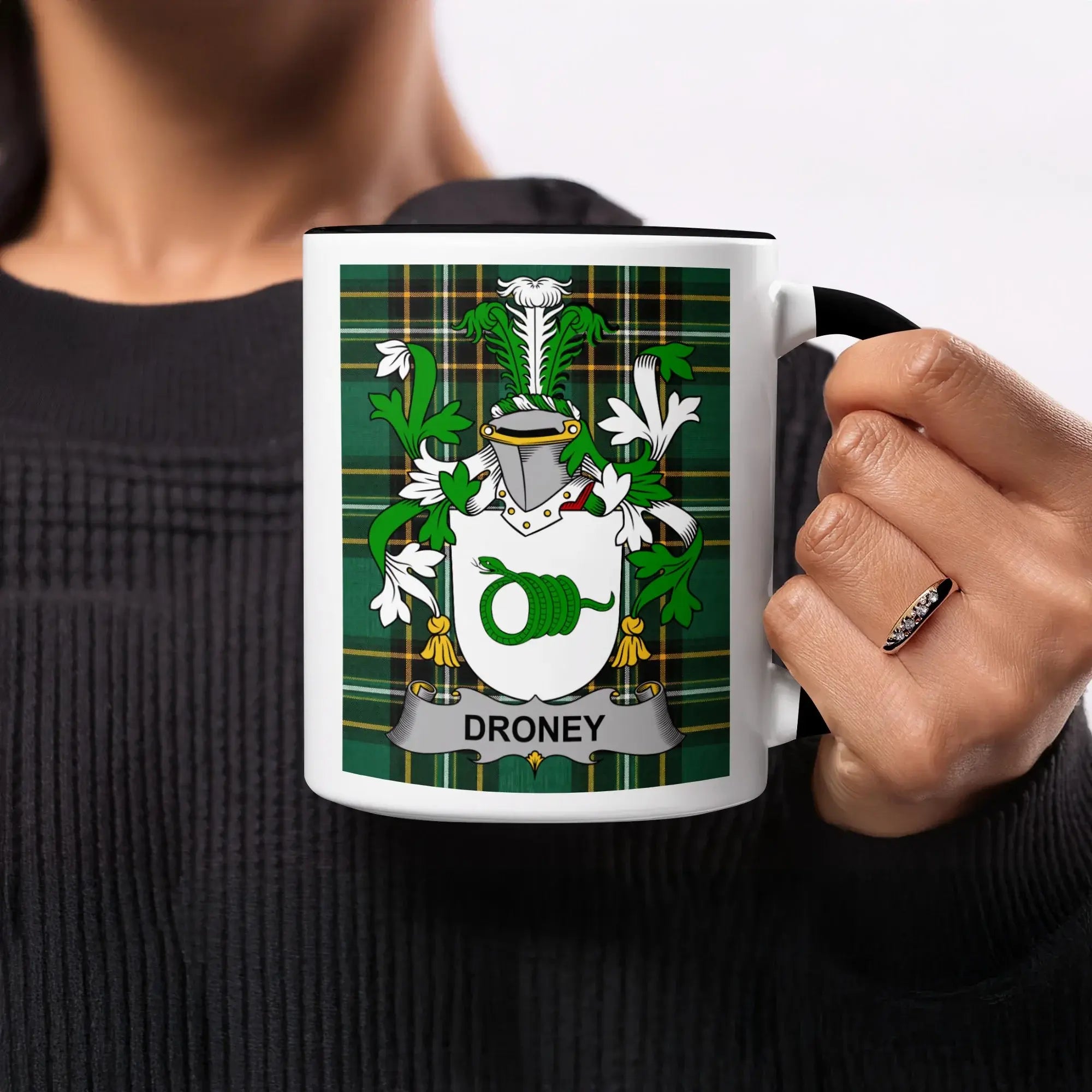 Mug with green plaid design and DRONEY family crest.
