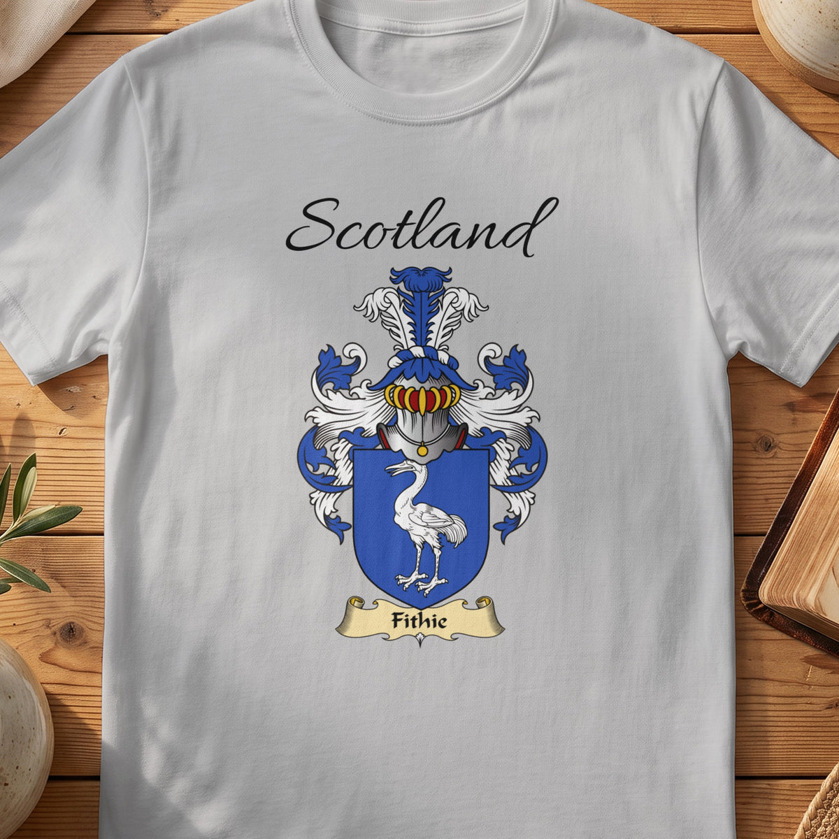 Sport Grey Fithie Scottish family shield T-shirt featuring a white long-legged bird on a blue shield