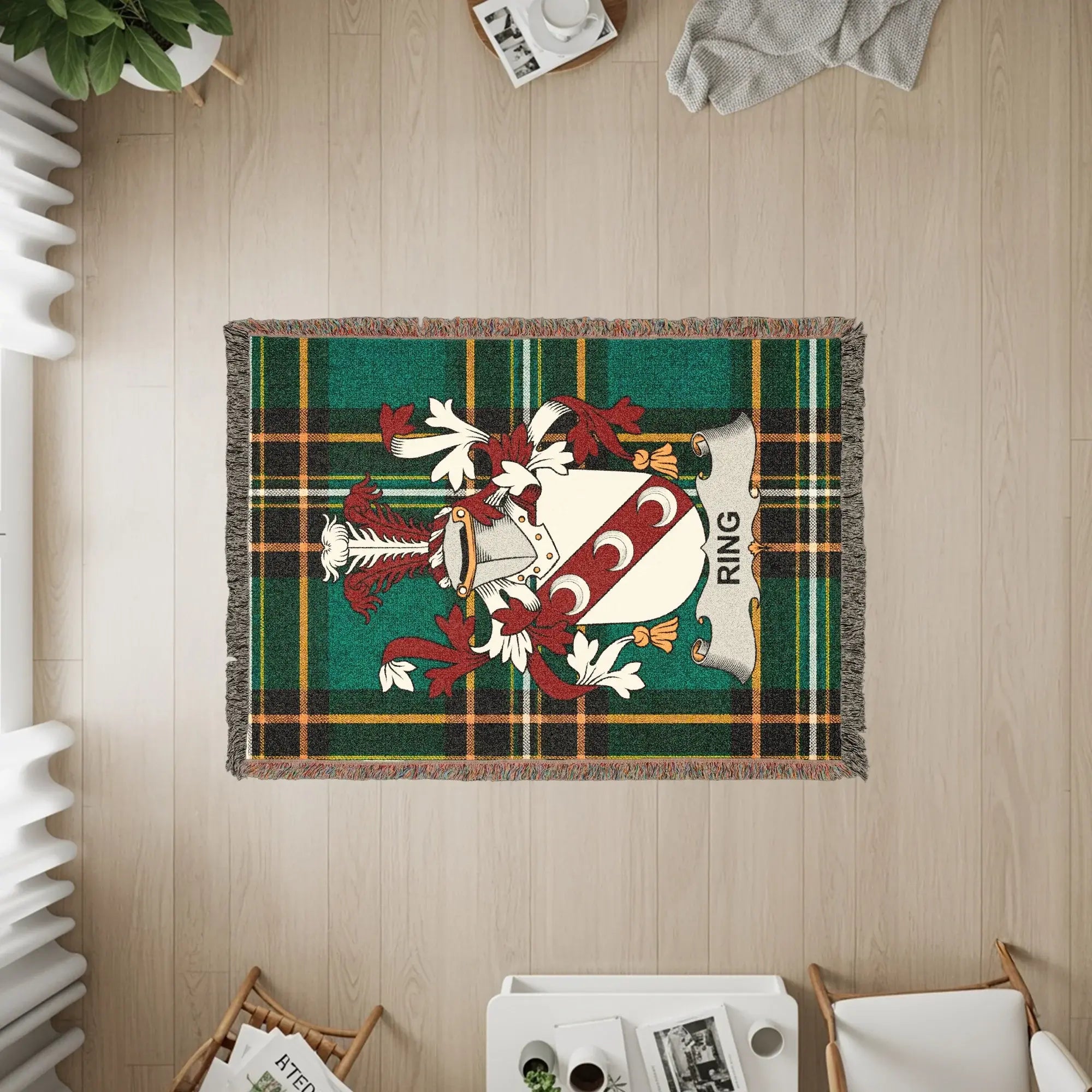 Green and red plaid tapestry with a coat of arms featuring "RING".