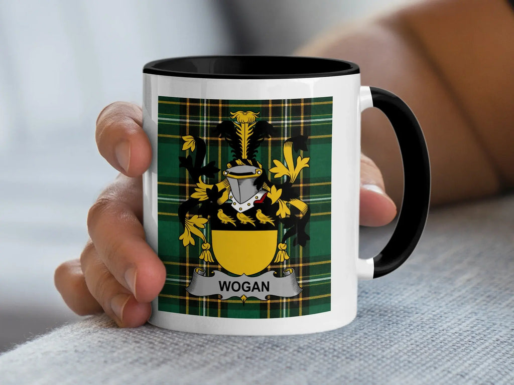 Mug with a Wogan family crest on a green tartan background.