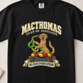 MacThomas Scottish clan T-shirt in Black, front view with a golden wildcat holding a green snake and motto banner.