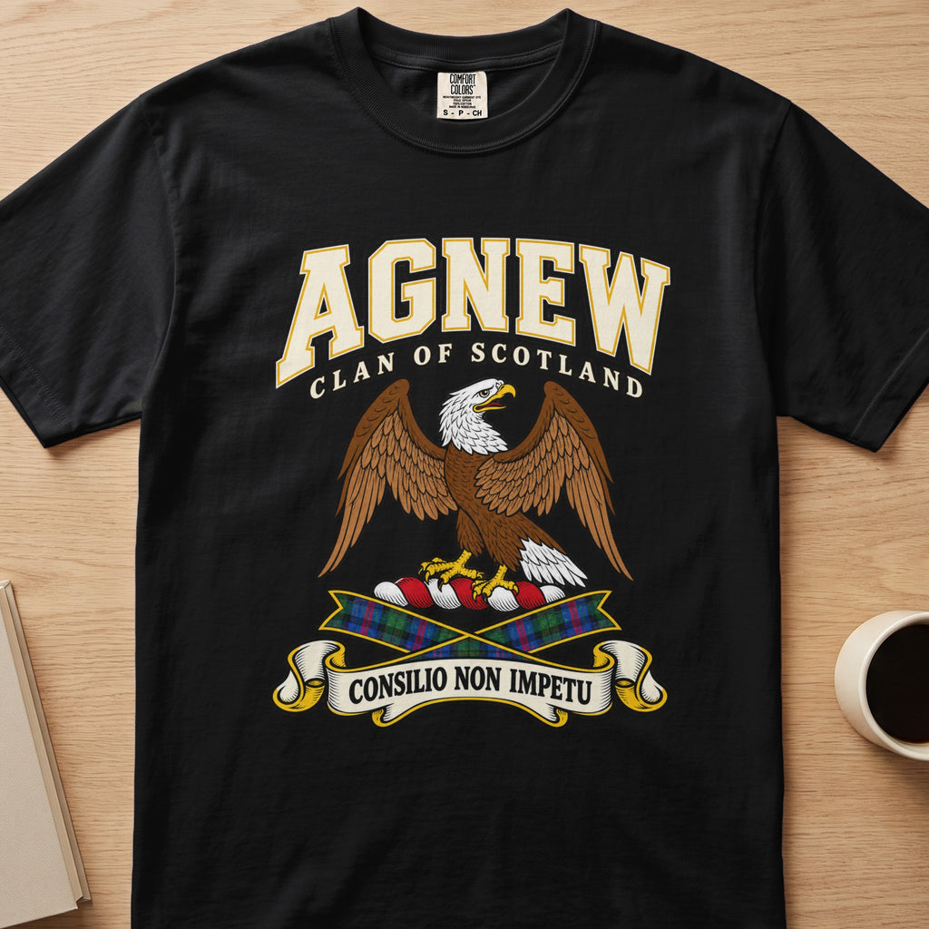 Agnew brown spread-wing bird crest graphic on a black Comfort Colors T-shirt, front view