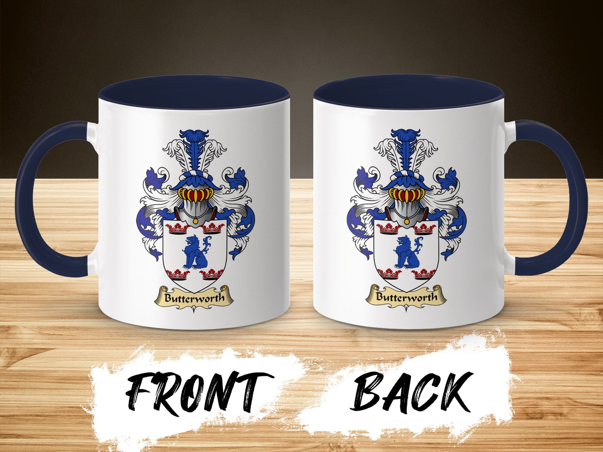 Two mugs with the Butterworth family crest on front and back, on a wooden surface.