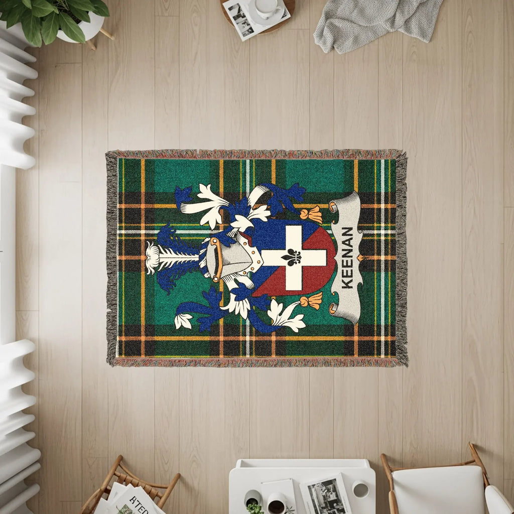 Keenan family crest on a woven blanket with plaid pattern.