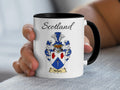 Neilson Scottish family crest accent mug with Scotland above the coat of arms design
