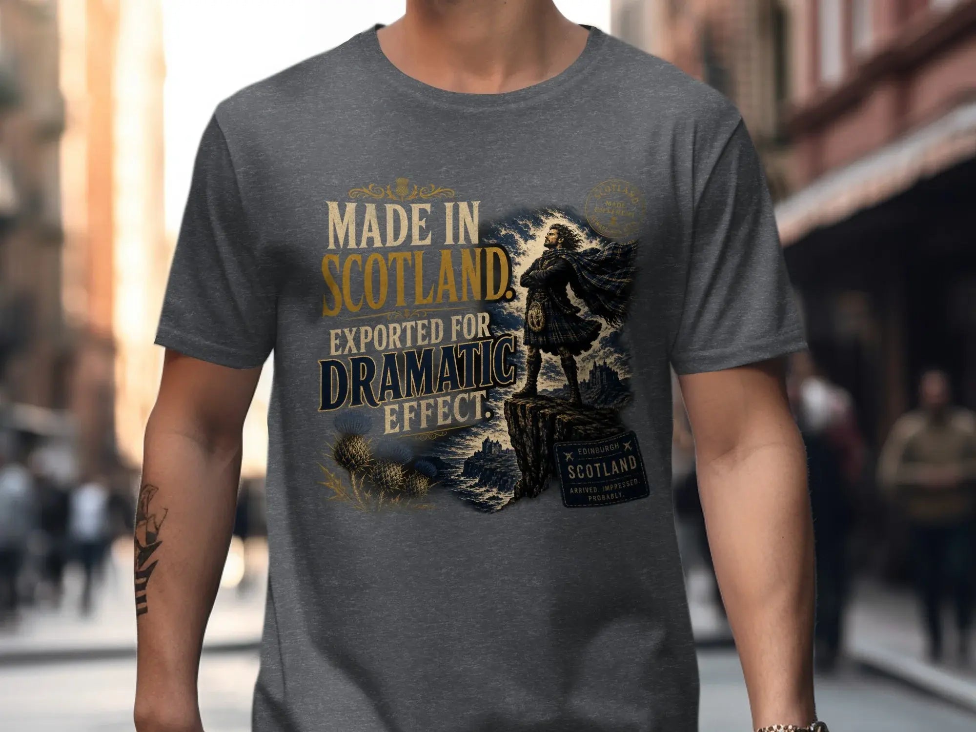 T-shirt graphic with "Made in Scotland, Exported for Dramatic Effect" text.