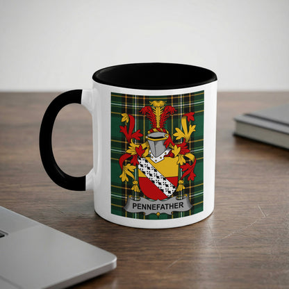 White mug with black handle featuring the Pennefather family crest on a plaid background.
