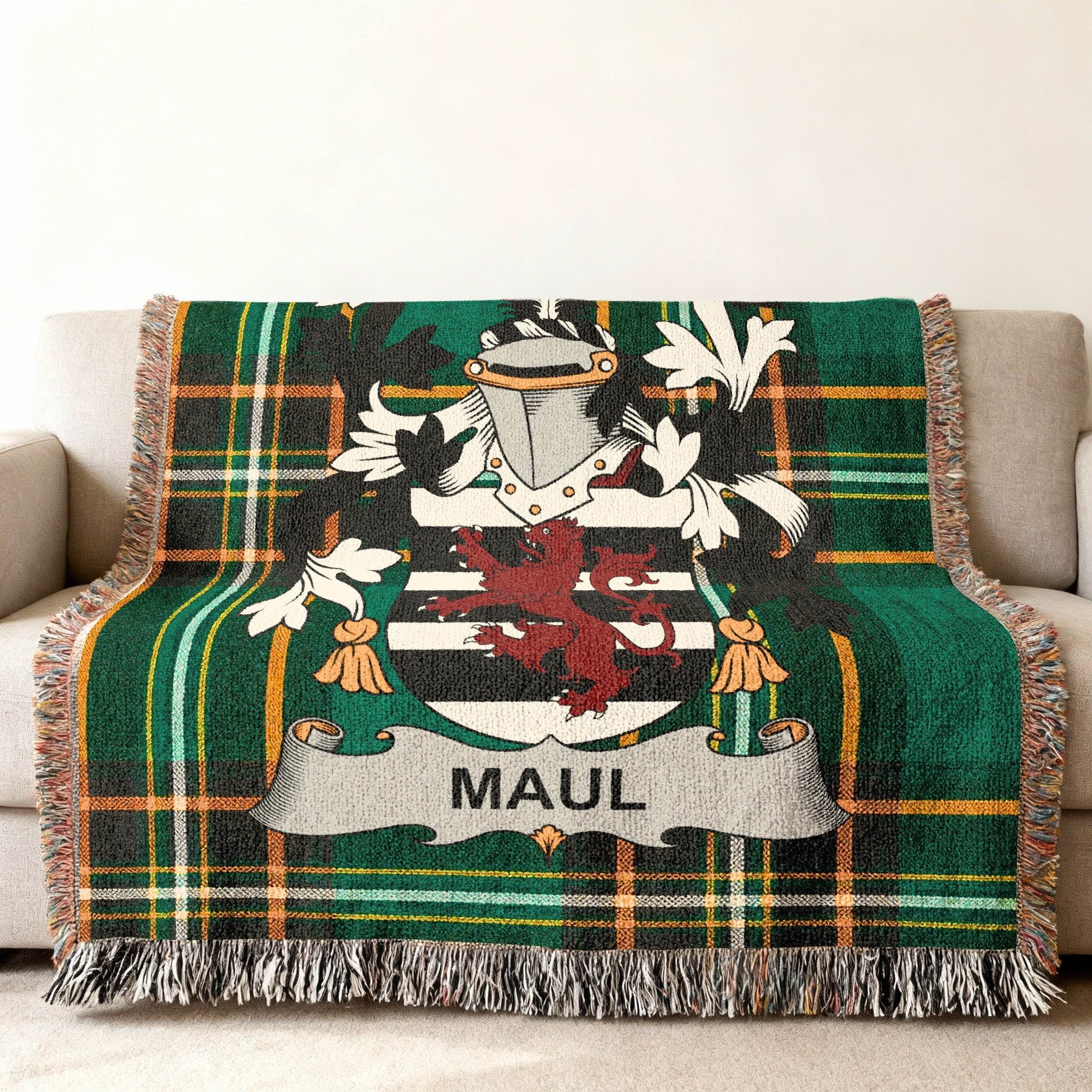 Green plaid throw blanket featuring the MAUL family crest.