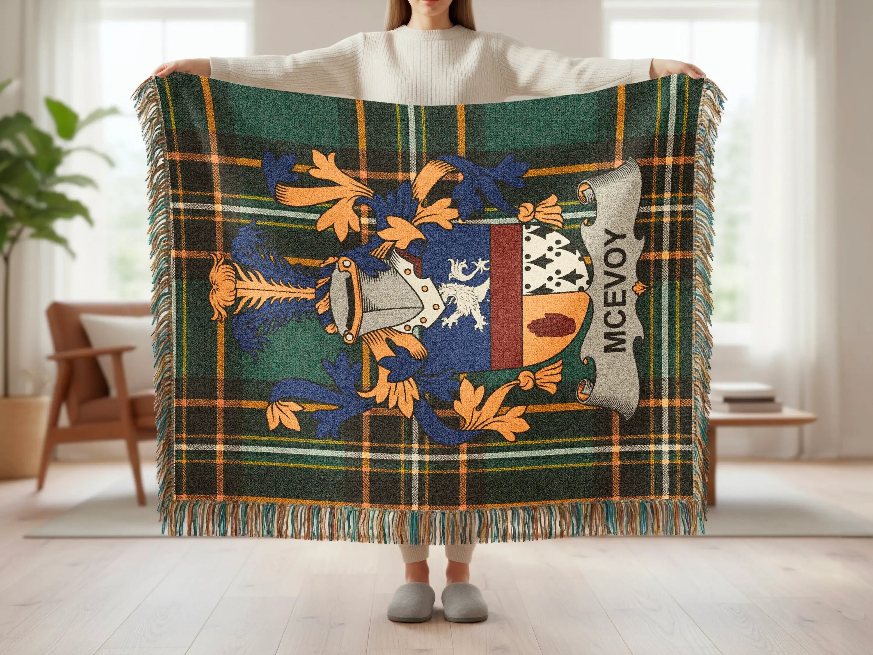 McEvoy family crest on a green and gold plaid blanket with fringe.