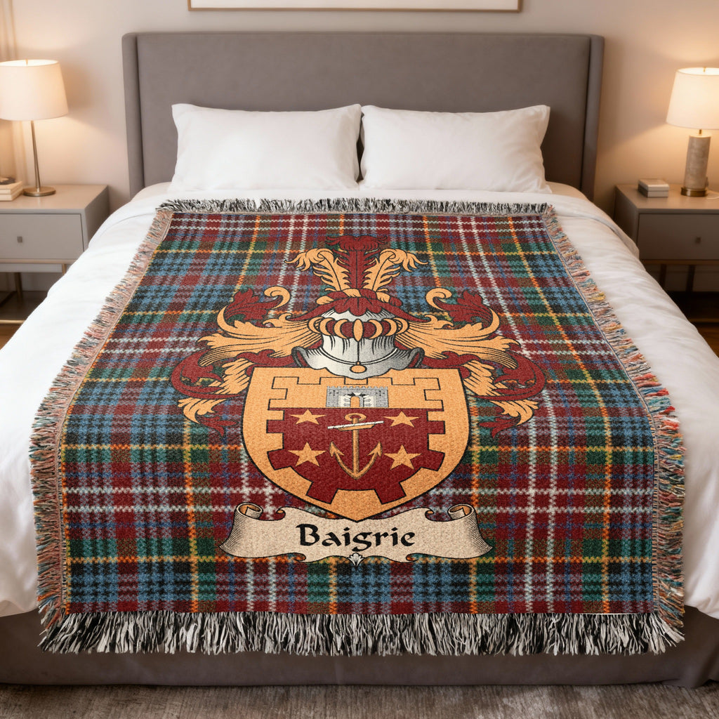 Baigrie family crest emblem on a Caledonia tartan woven blanket